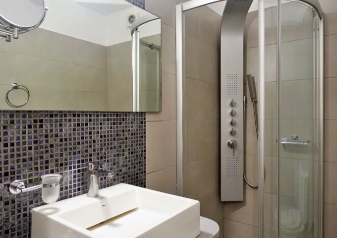 The bathrooms come with hydrotherapy showers and contemporary fixtures.