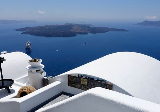 The hotel offers stunning views of the volcanoes and the caldera.