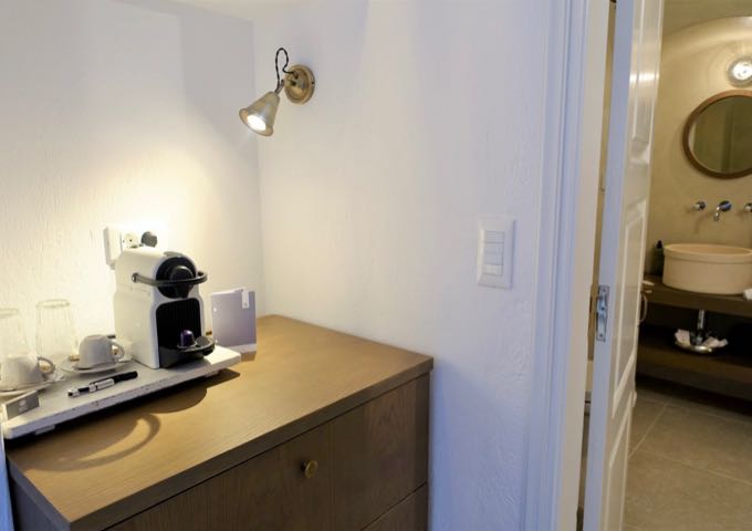 The suite has a minibar and a coffee station with a Nespresso machine.