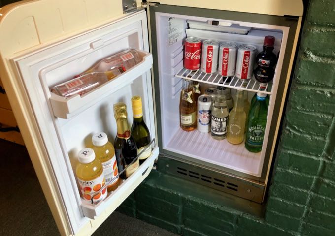 Minifridge stocked with drinks in Palihotel Seattle