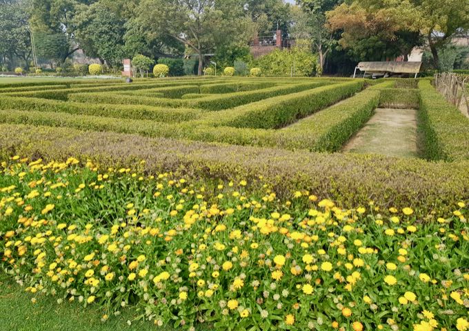 The grounds even have a maze of hedges for the family.