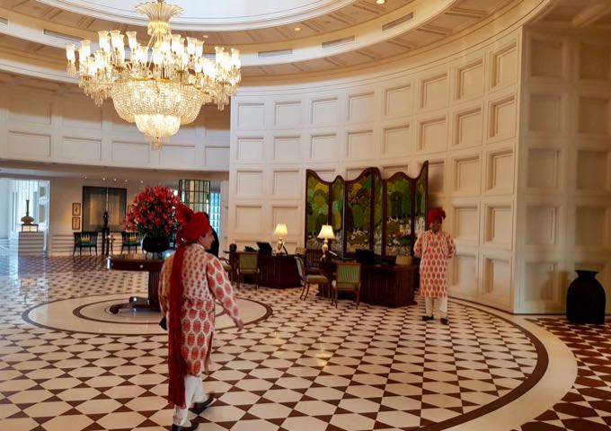 The hotel lobby is opulent, and the staff is also traditionally-dressed.