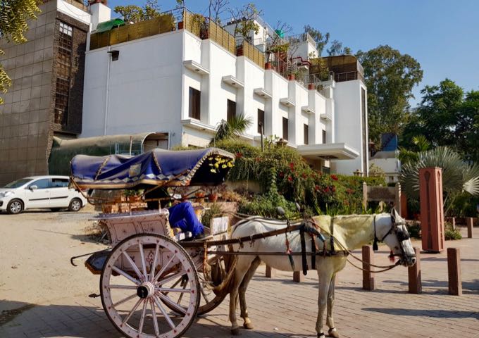 Horse carts are a unique way to reach the Taj Mahal nearby.