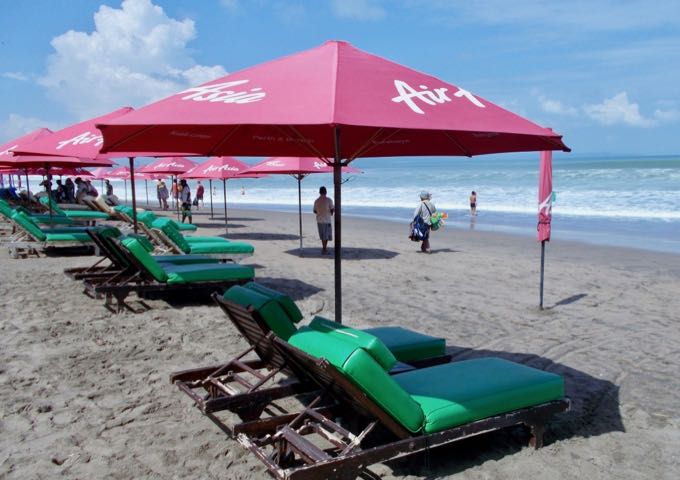 There are plenty of lounge chairs and drink stalls on the beach.