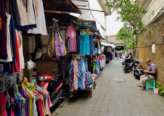 The lane connecting to Monkey Forest road is lined with souvenir stalls.