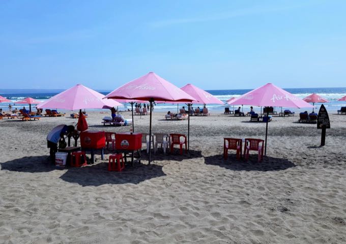 Seminyak Beach has grey sand, plenty of umbrellas, and lots of drink stalls.