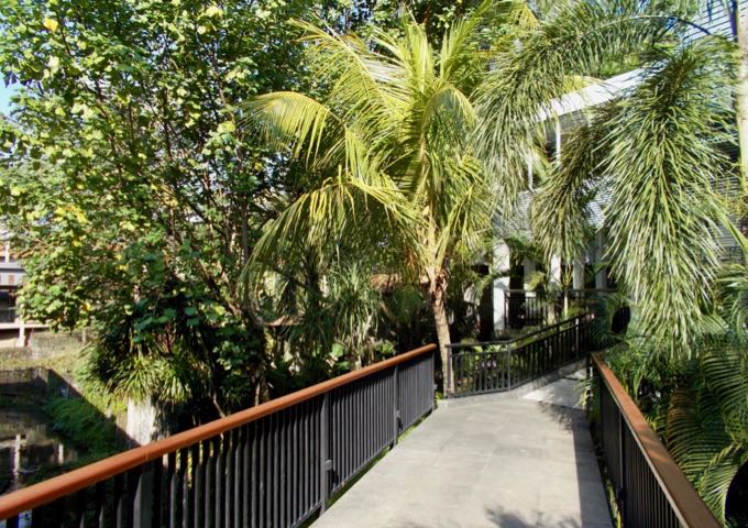 Paths and a bridge connect to the suites and villas.