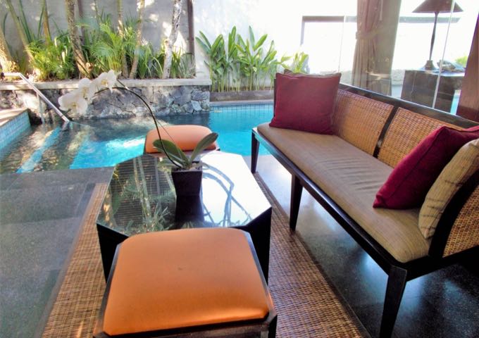 The pool villas come with spacious open-air living rooms.