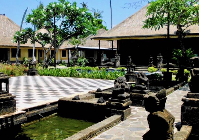 The hotel grounds are decorated with Balinese artifacts.