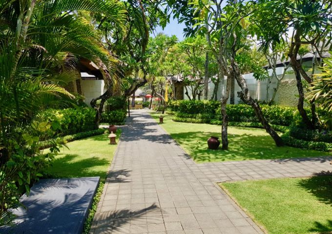 Luxurious villas are connected by garden paths.