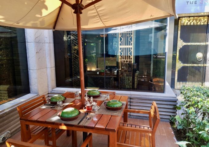 The China Kitchen offers outdoor seating by the gardens.