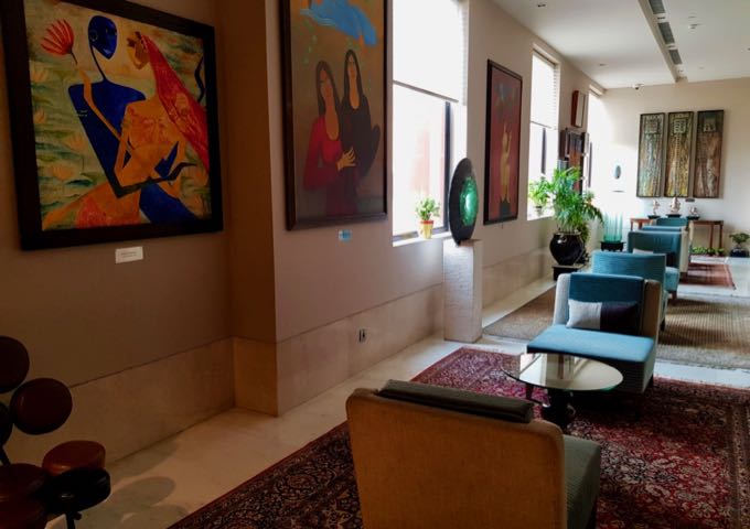 The guest lounge features a private art collection.