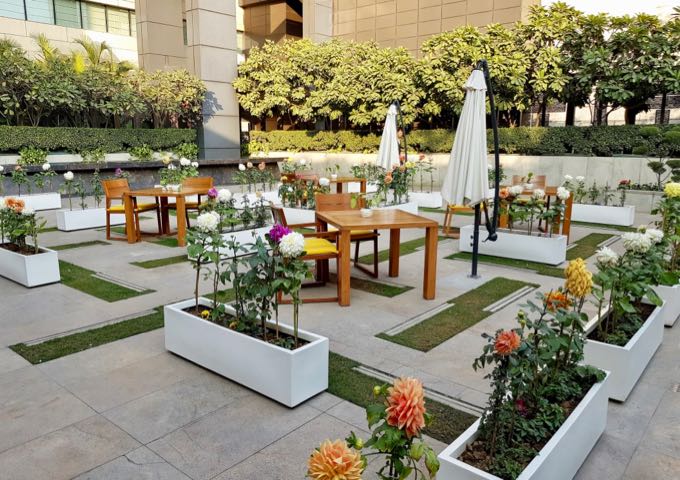 The hotel courtyard is decorated with seasonal flowers.
