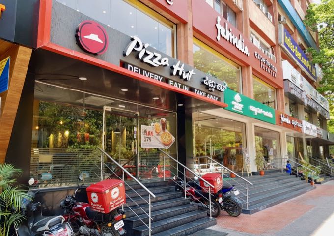 A Pizza Hut outlet is also located in the same building.
