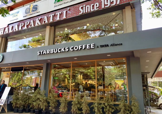 A Starbucks outlet is located at the corner of Midford Garden Road and M.G. Road.