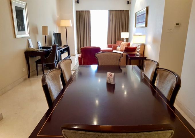 The larger apartments have big dining tables.