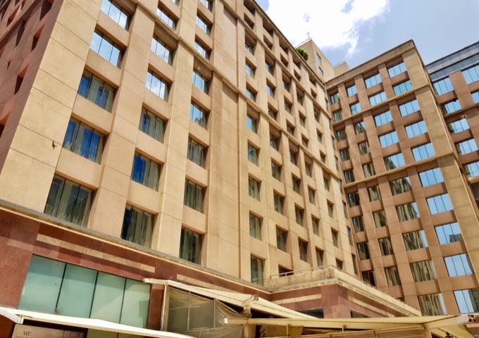 Some apartments offer views of UB City mall's outdoor bistro area.