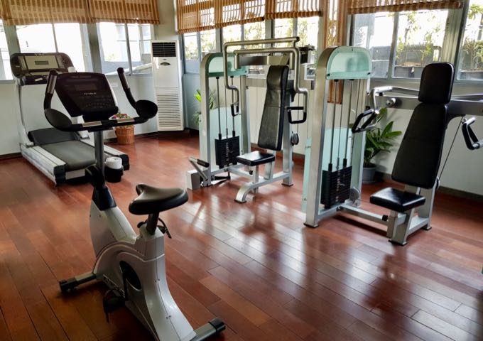 The small gym is located on an upper floor.
