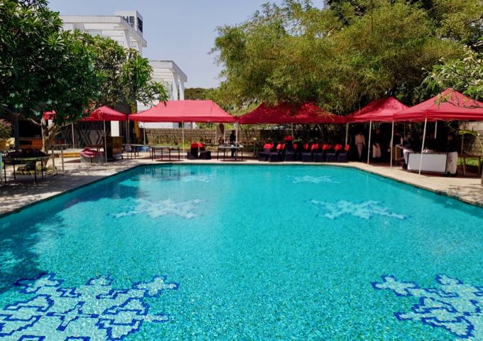 The outdoor pool is large and inviting.