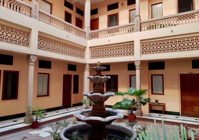 The courtyard-facing rooms are better and quieter.