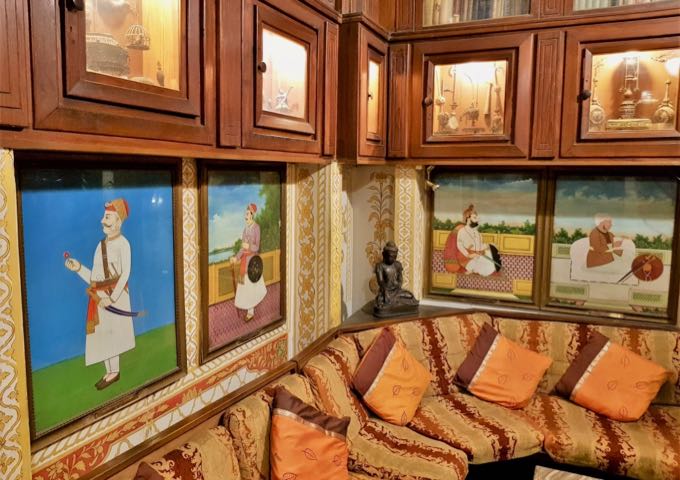 Some guest lounge walls feature bright paintings and fascinating relics.