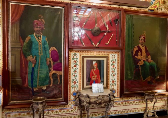 The guest lounge also features paintings of the king and queen who built the palace.
