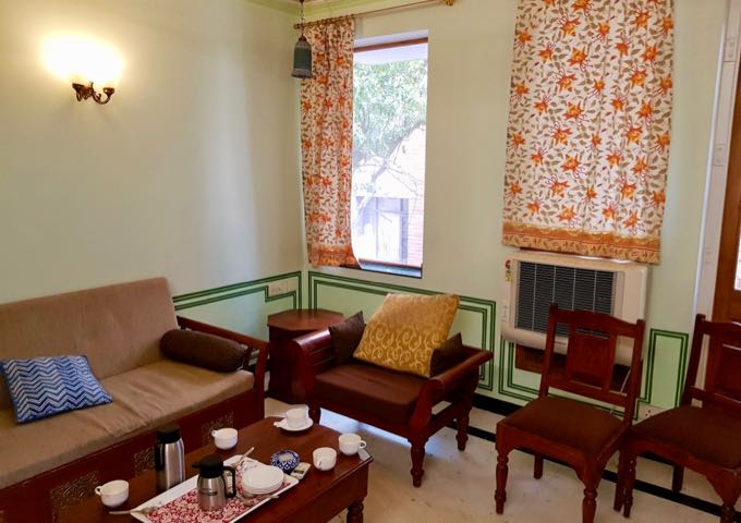 The larger suites' living areas are well-furnished and have plenty of windows.