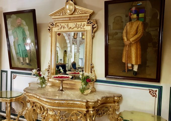 The lobby hosts the portraits of a former king and queen of Rajasthan.