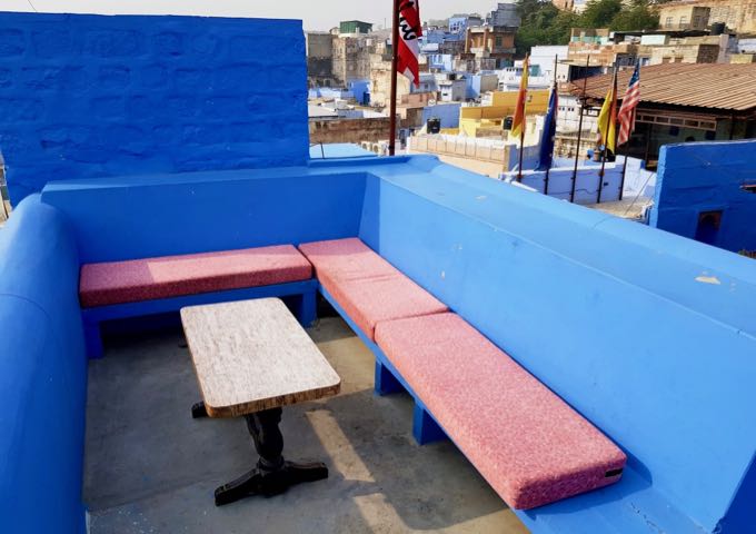 The rooftop has comfortable seating with fort views.