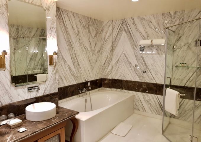 All bathrooms are spacious, modern, and made of marble.