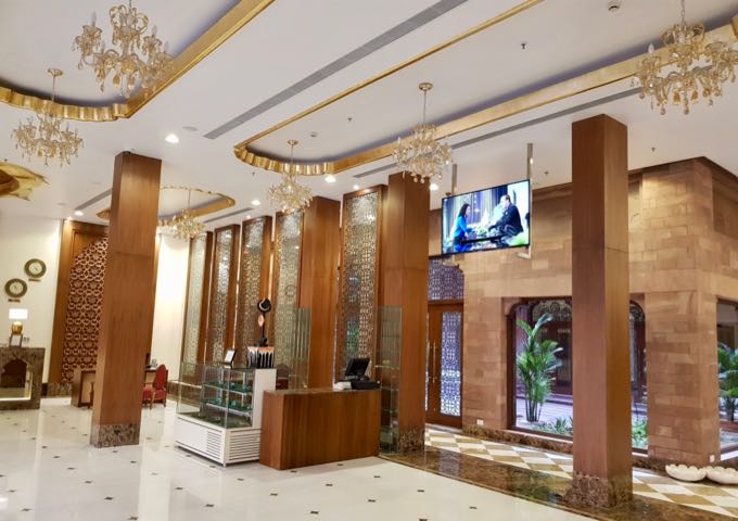 The opulent lobby showcases the grandeur of the hotel.