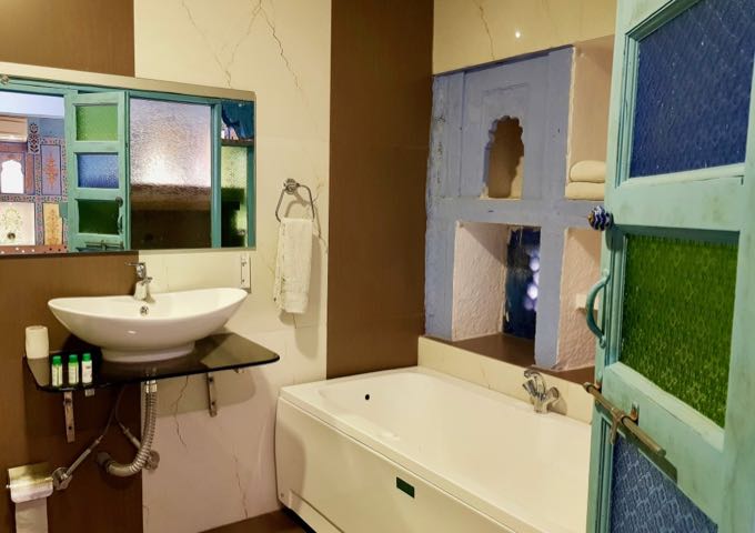 The modern bathrooms are brightly decorated.