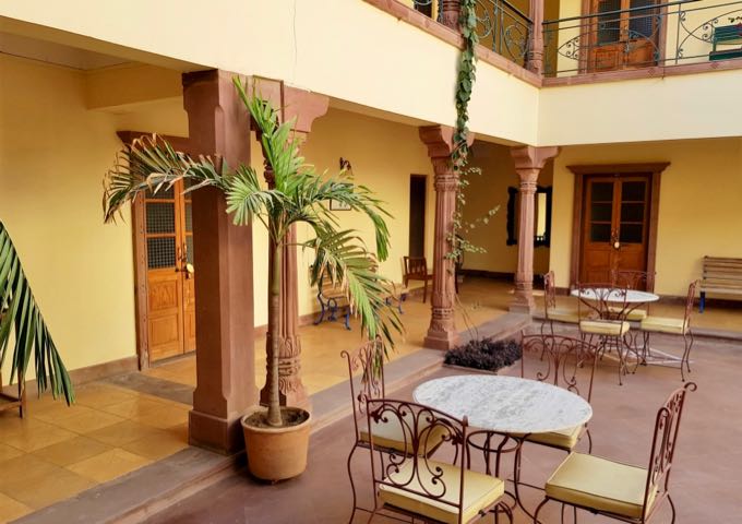 The hotel has a 2-story building surrounding the courtyards.