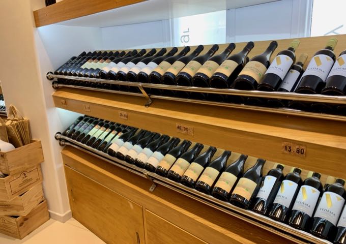 Display of wine for purchase at Santo Wines, Santorini