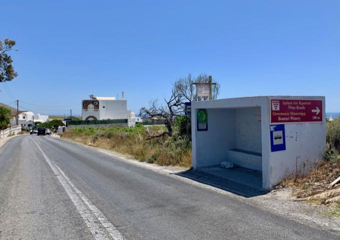 Megalochori bus stop, with signage pointing to Boutari Winery.