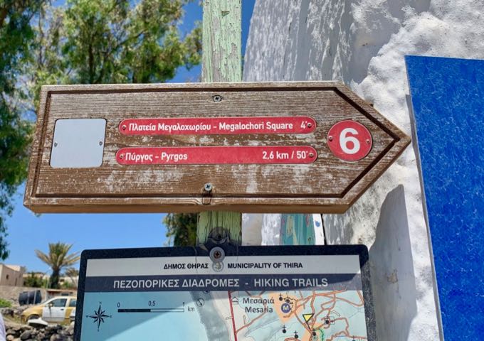 Sign pointing the way to Megalochori village.