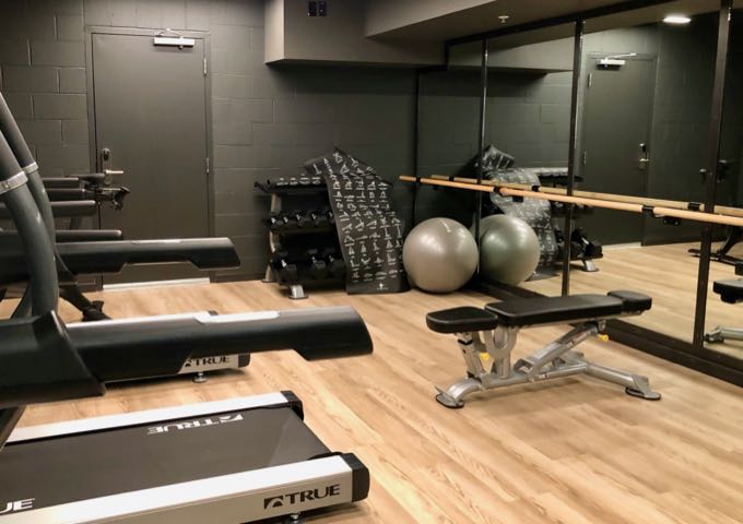 Free weights and yoga mat in State Hotel fitness center