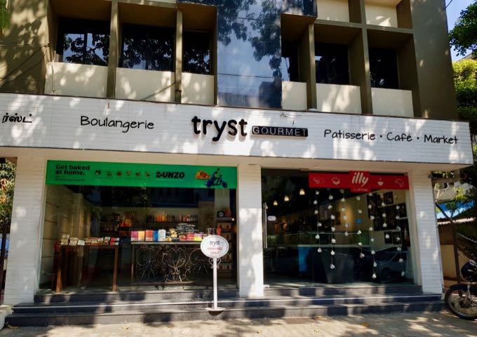 Tryst Gourmet patisserie, coffee shop, and supermarket is close to Starbucks.