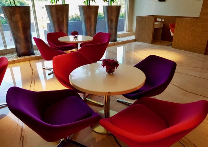 The guest lounge has colorful seating.