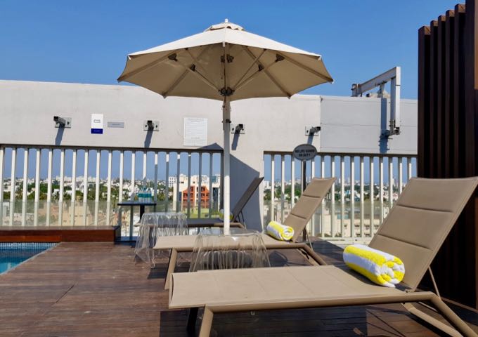 Guests can relax on the limited sunbeds or the lounge area on the rooftop.