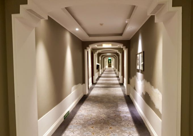 Corridors feature marble floors and plush carpets.