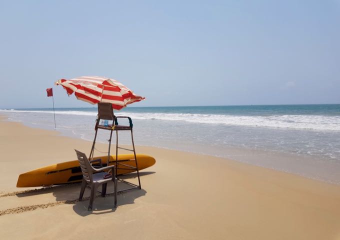 Flags identify areas with lifeguards that are safe to swim in.