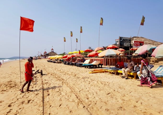 Flags identify areas with lifeguards that are safe to swim in.