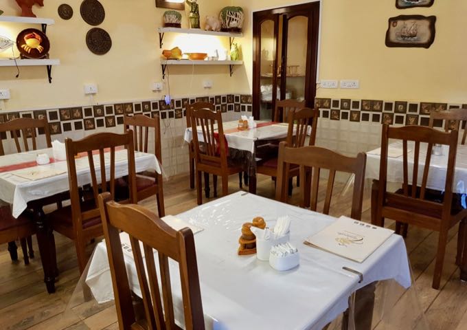 Caravela restaurant nearby offers air-conditioning and a lovely decor.