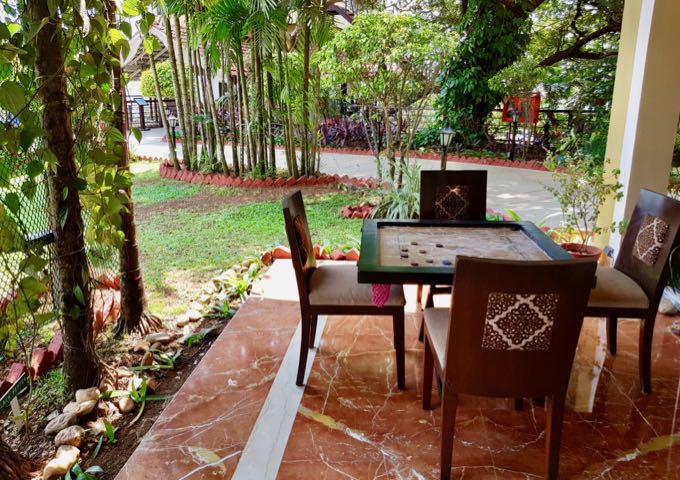 Some of the garden tables feature board games.