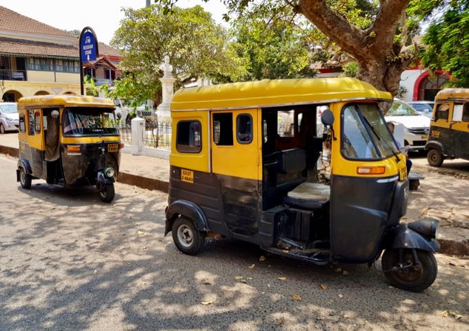 Auto-rickshaws are common in the area.