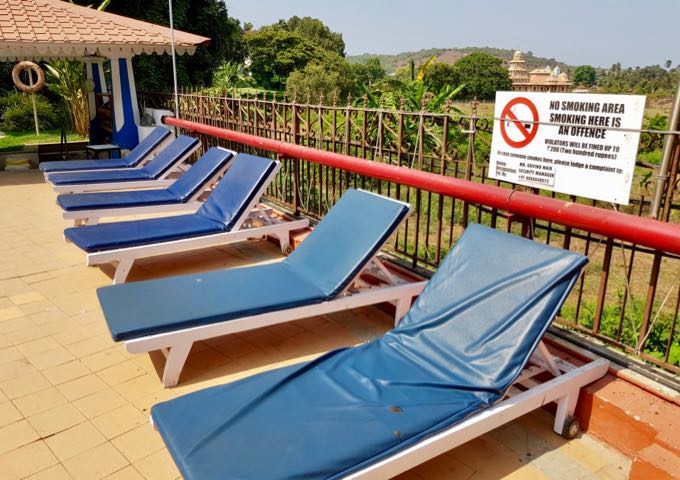 Sunbeds overlook the farms.