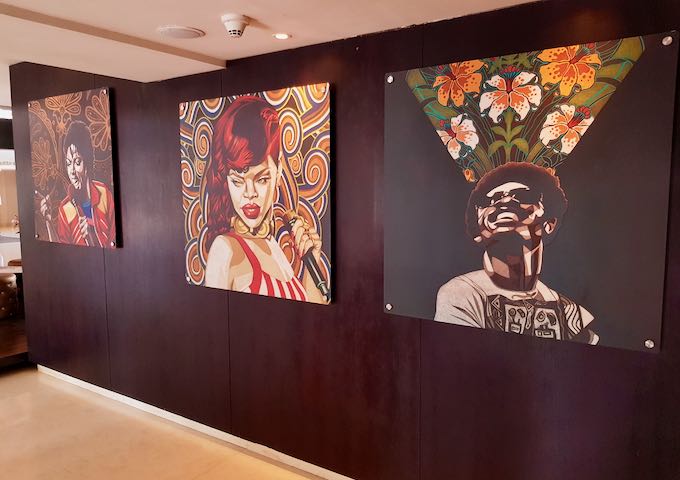 The lobby is adorned with murals of musical celebrities.