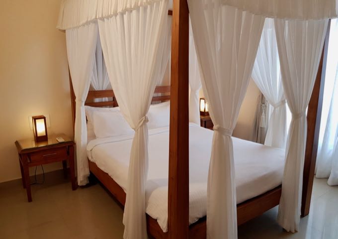The villas' main bedrooms feature 4-poster beds.