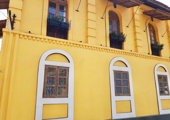 The guesthouse is brightly painted.